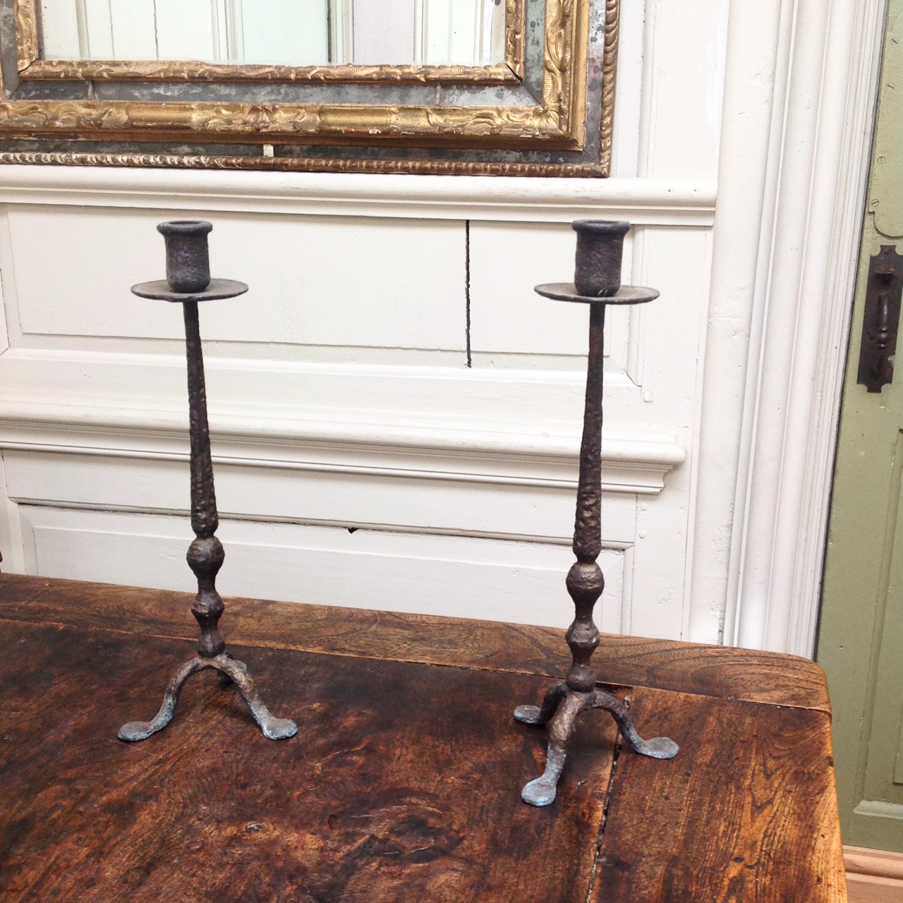 Pair Arts and Crafts period bronze candlesticks