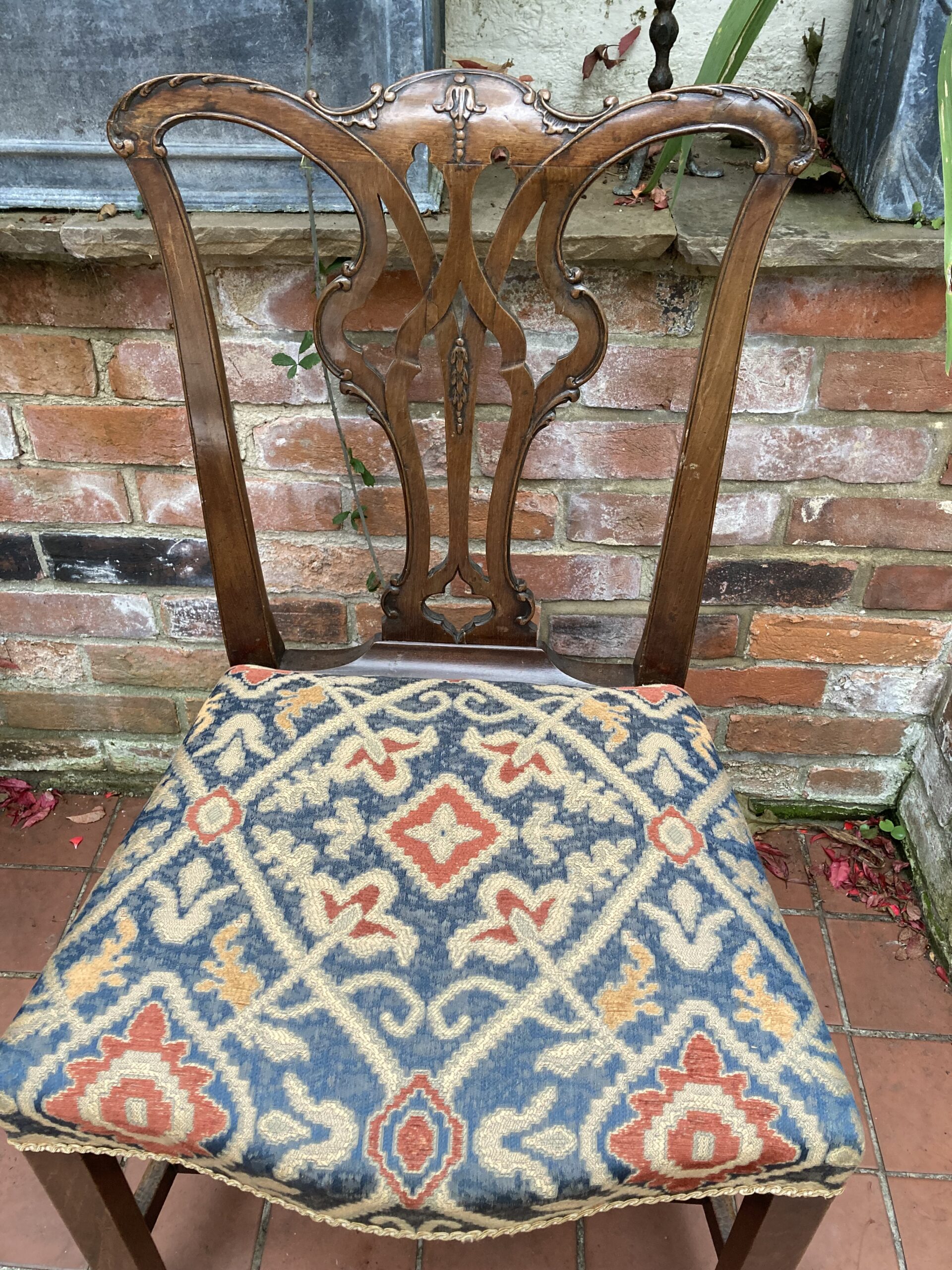 Mid 18th century English side chair, restrained carved back.
